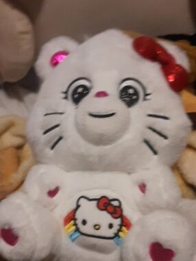 Hello Kitty White Plush with Red Bow and Rainbow Patch